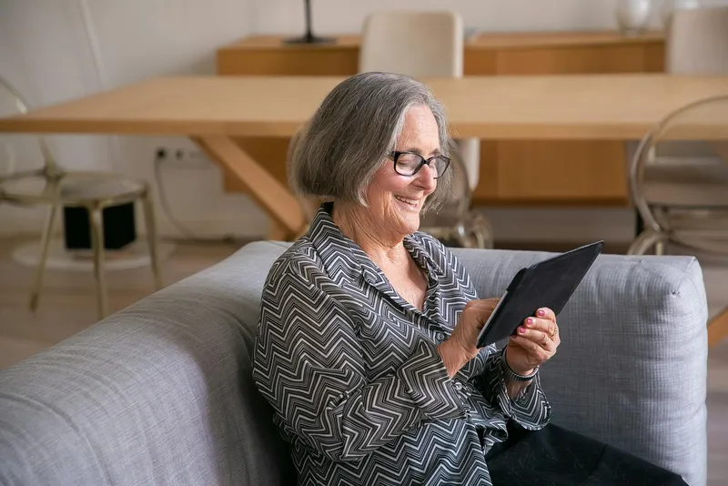 A woman smiling during a video call